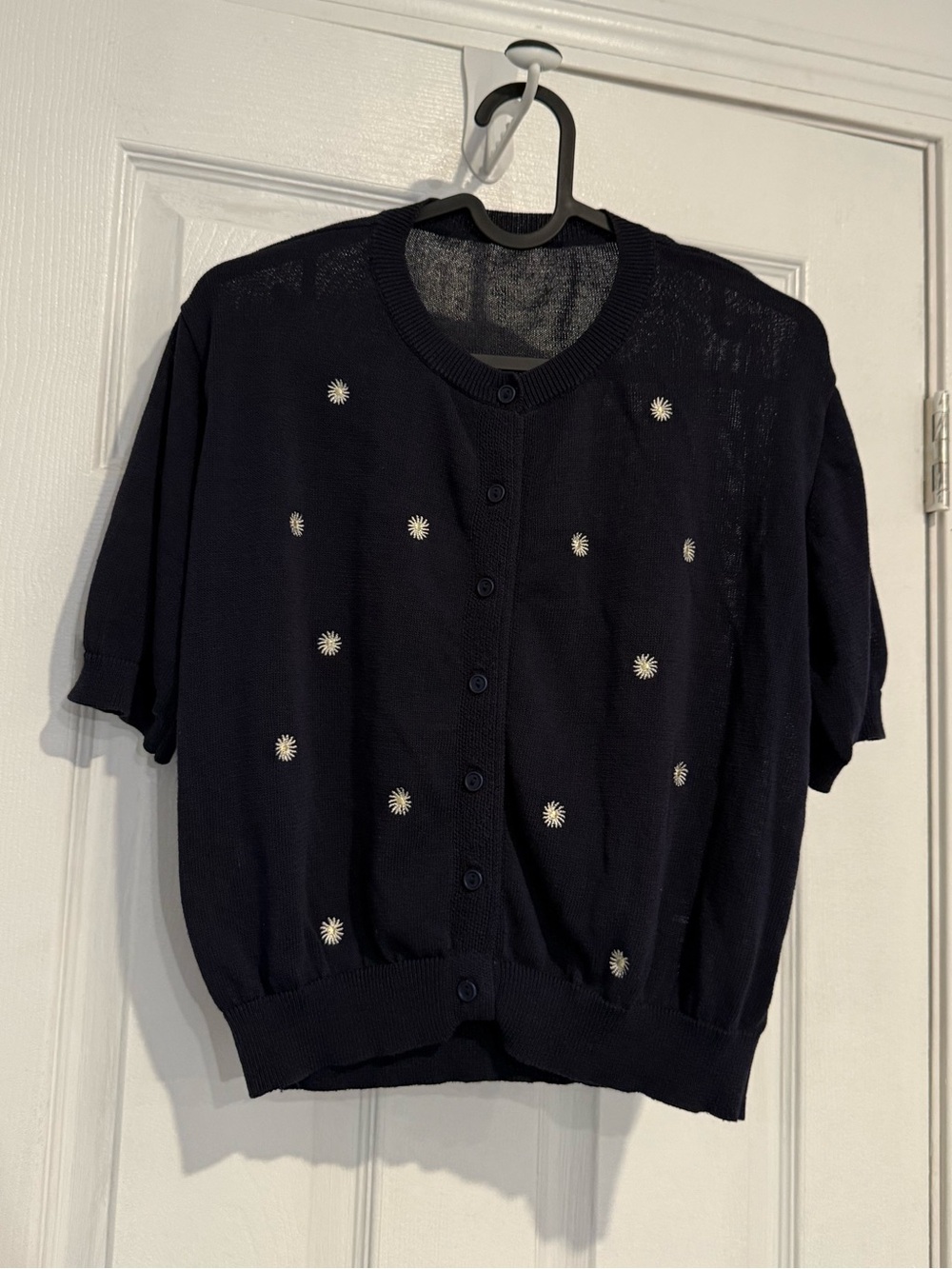 100% viscose fiber daisy embroidered round neck button down short sleeves top